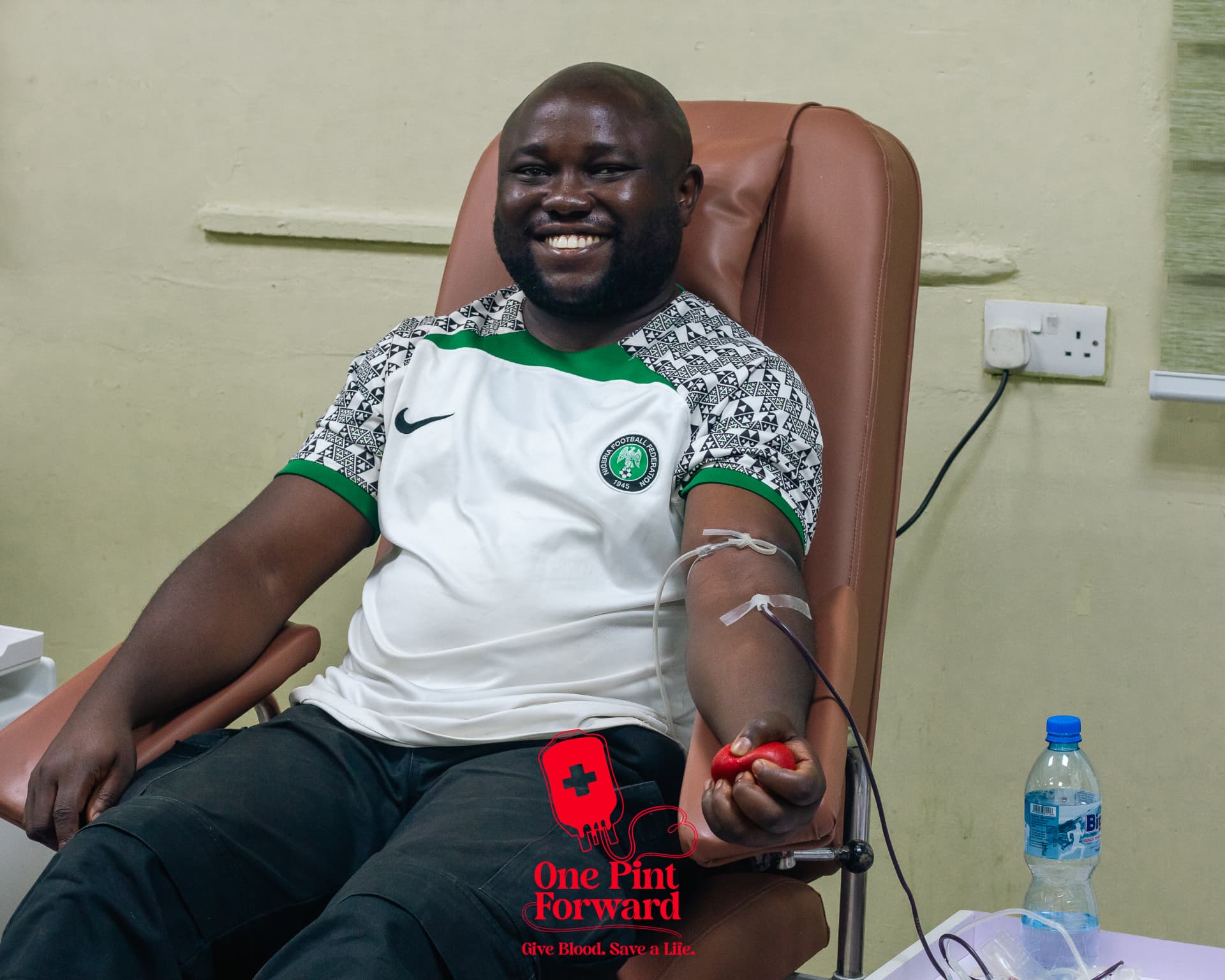 A smiling donor giving blood during the drive.